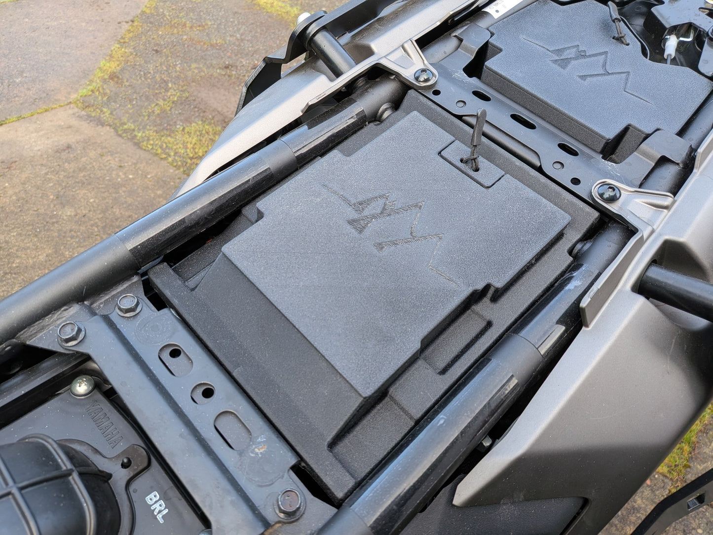 MotoCubby Drifter II and Nomad III installed together on a 2025 Yamaha Ténéré 700 — under-pillion and under-seat storage in place